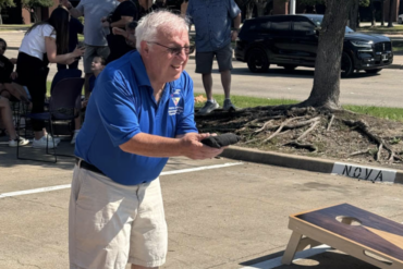 Corn hole player. Photo courtesy Odd Fellows of Texas Plano Lodge #114